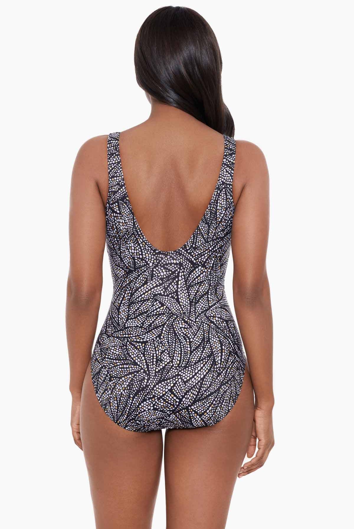 Miraclesuit Shore Leave Zipt One Piece Swimsuit. Looks 10 lbs lighter in 10 seconds, the time it takes to slip on a Miraclesuit