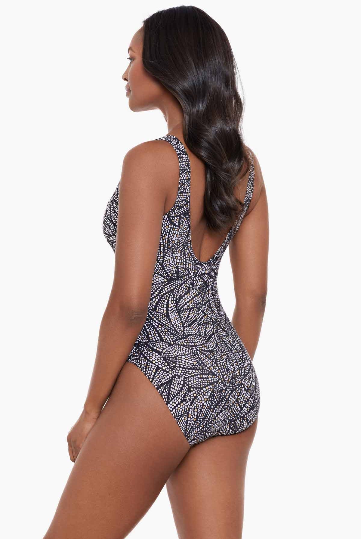 Miraclesuit Shore Leave Zipt One Piece Swimsuit. Looks 10 lbs lighter in 10 seconds, the time it takes to slip on a Miraclesuit