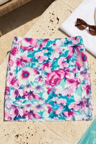 Sielei Floral Swim Skirt in teal and purple print stetch cover up